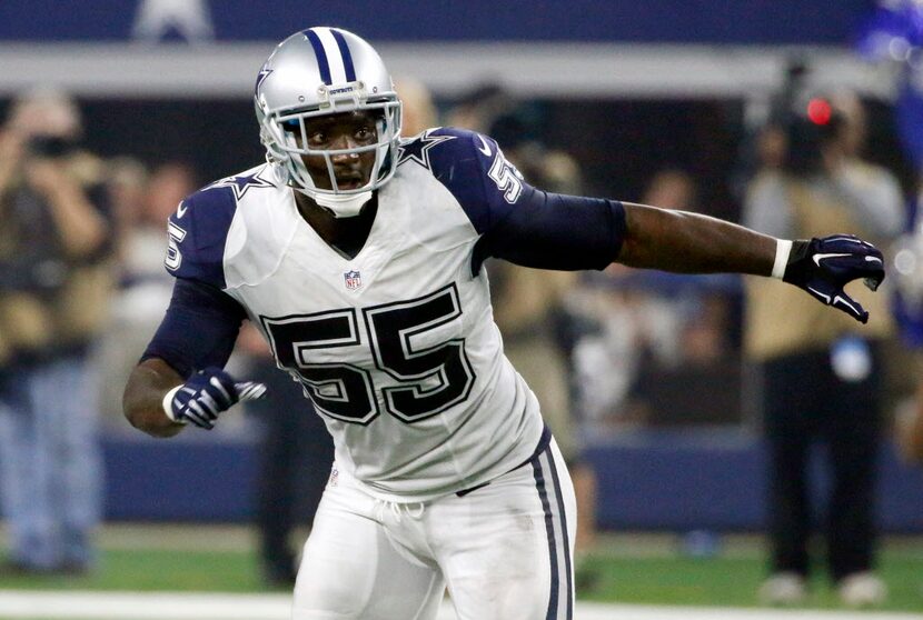 FILE - In this Nov. 26, 2015, file photo, Dallas Cowboys' Rolando McClain defends against...