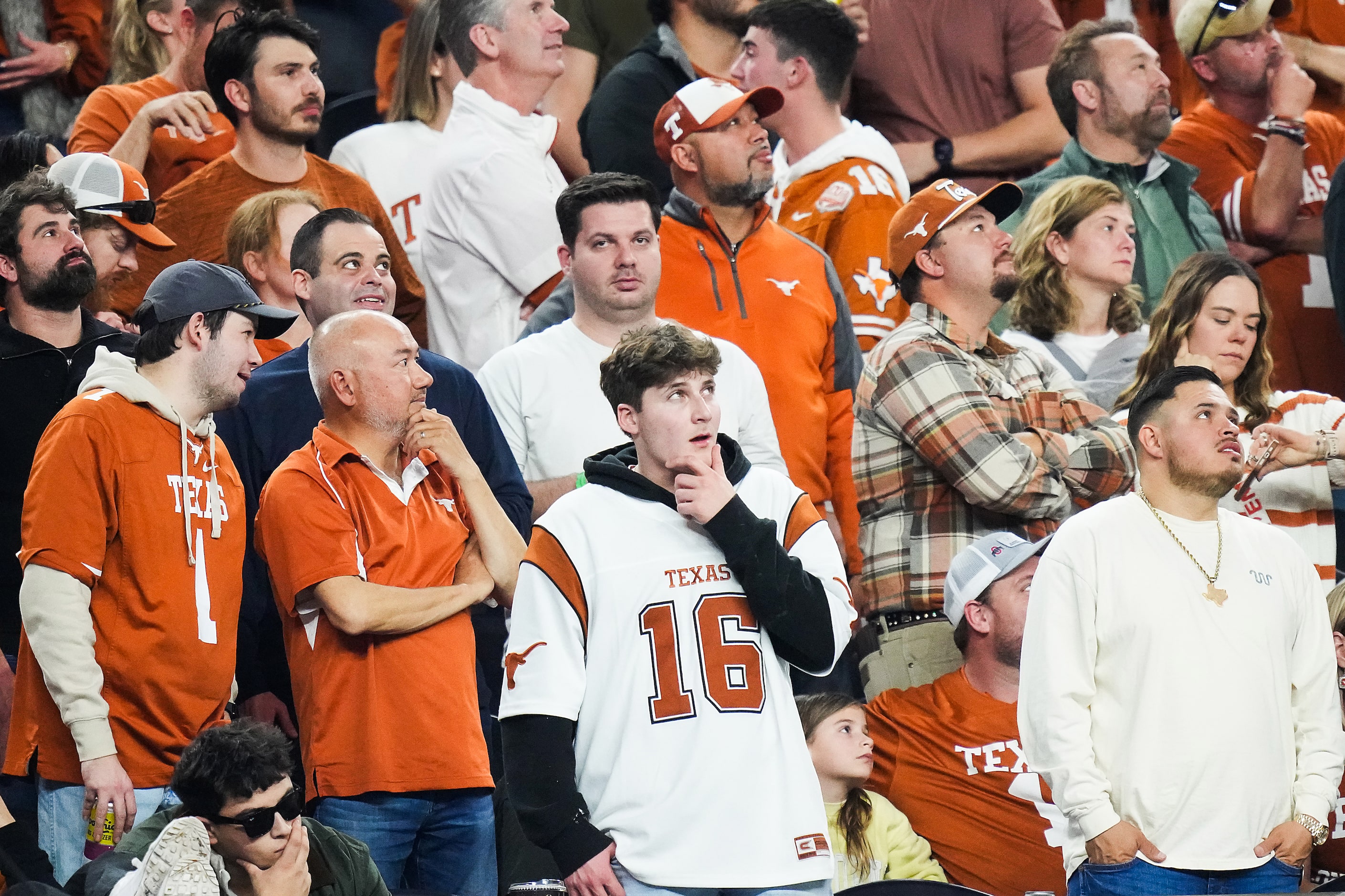 Texas fans react after Ohio State defensive end Jack Sawyer returned a fumble for a...