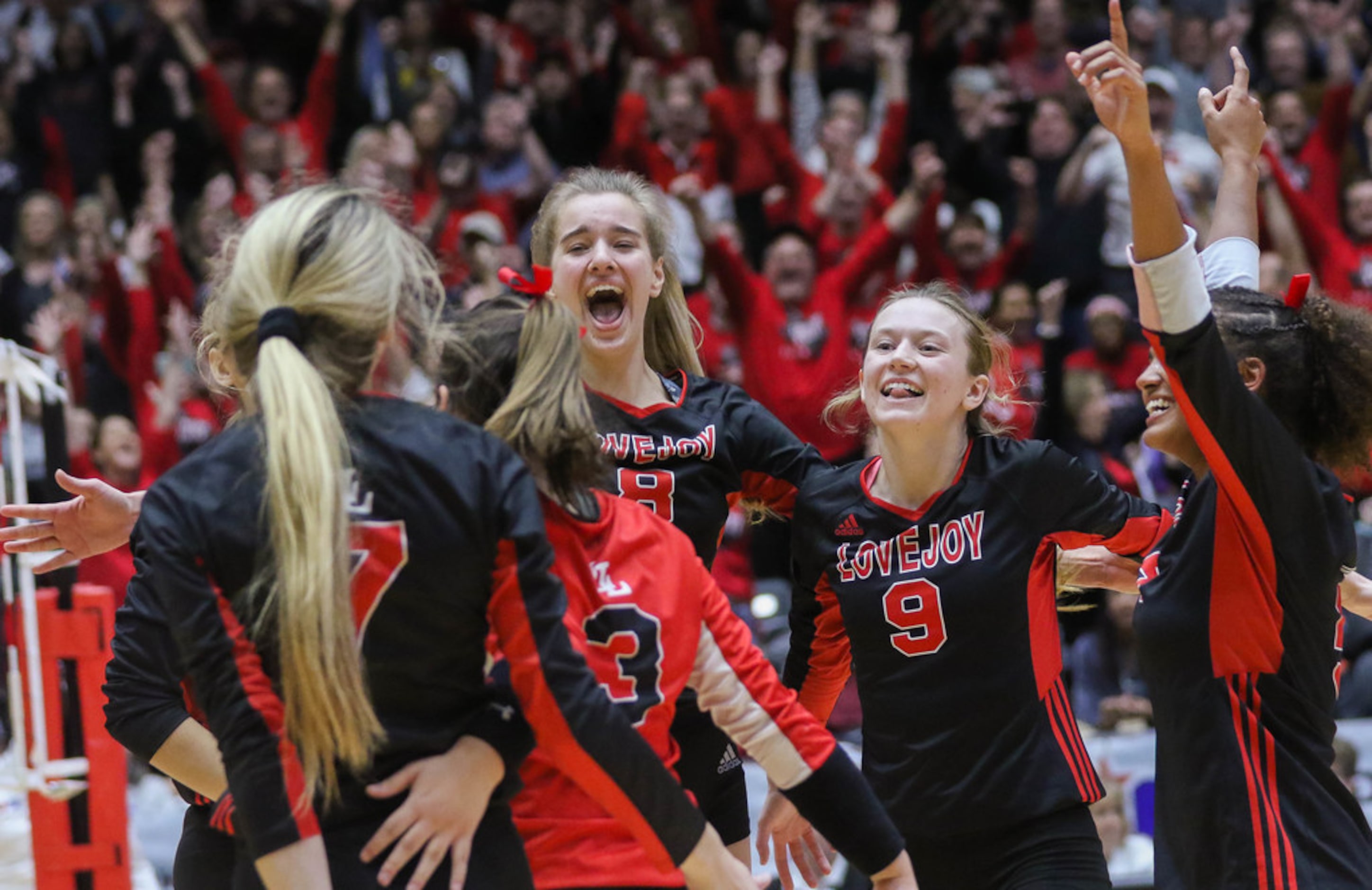 The Lovejoy Leopards celebrate after beating Friendswood in the fourth and final set of a...