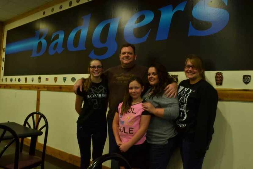  From left, Danielle, Erich, Lilly, Emilee and Shelly Klein stand in front of the Badgers...