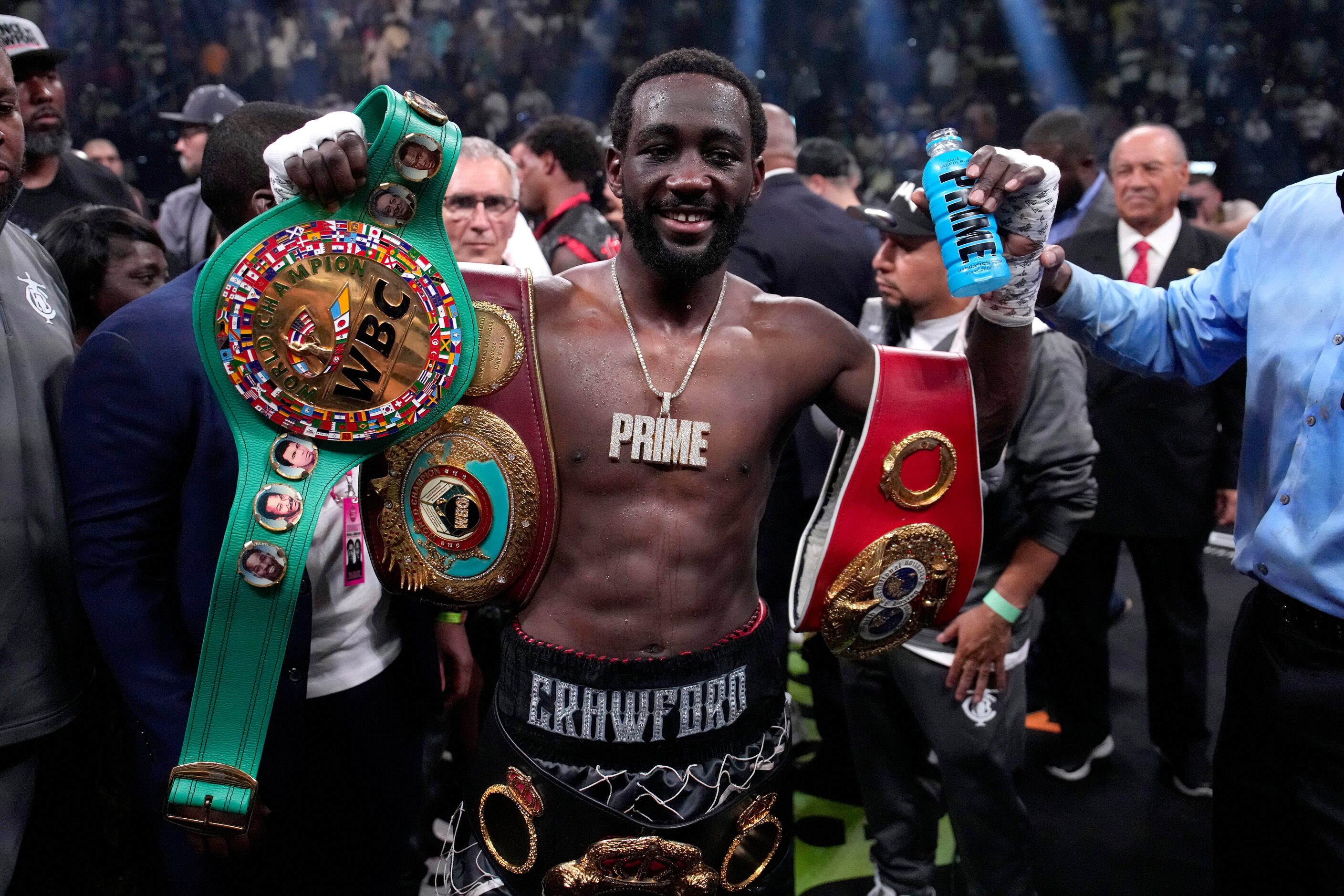 Terence Crawford celebrates his defeat of Errol Spence Jr. after their undisputed...