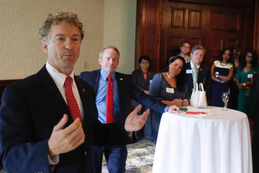 Sen. Rand Paul, (R-Ky.), left, answers question at a fundraiser for Texas Senate candidate...