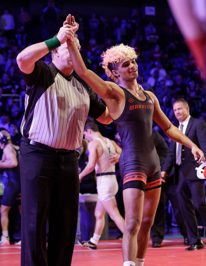 Shawn Ryncarz of Arlington Martin (right) defeats Caio Aron of Conroe Woodlands College Park...