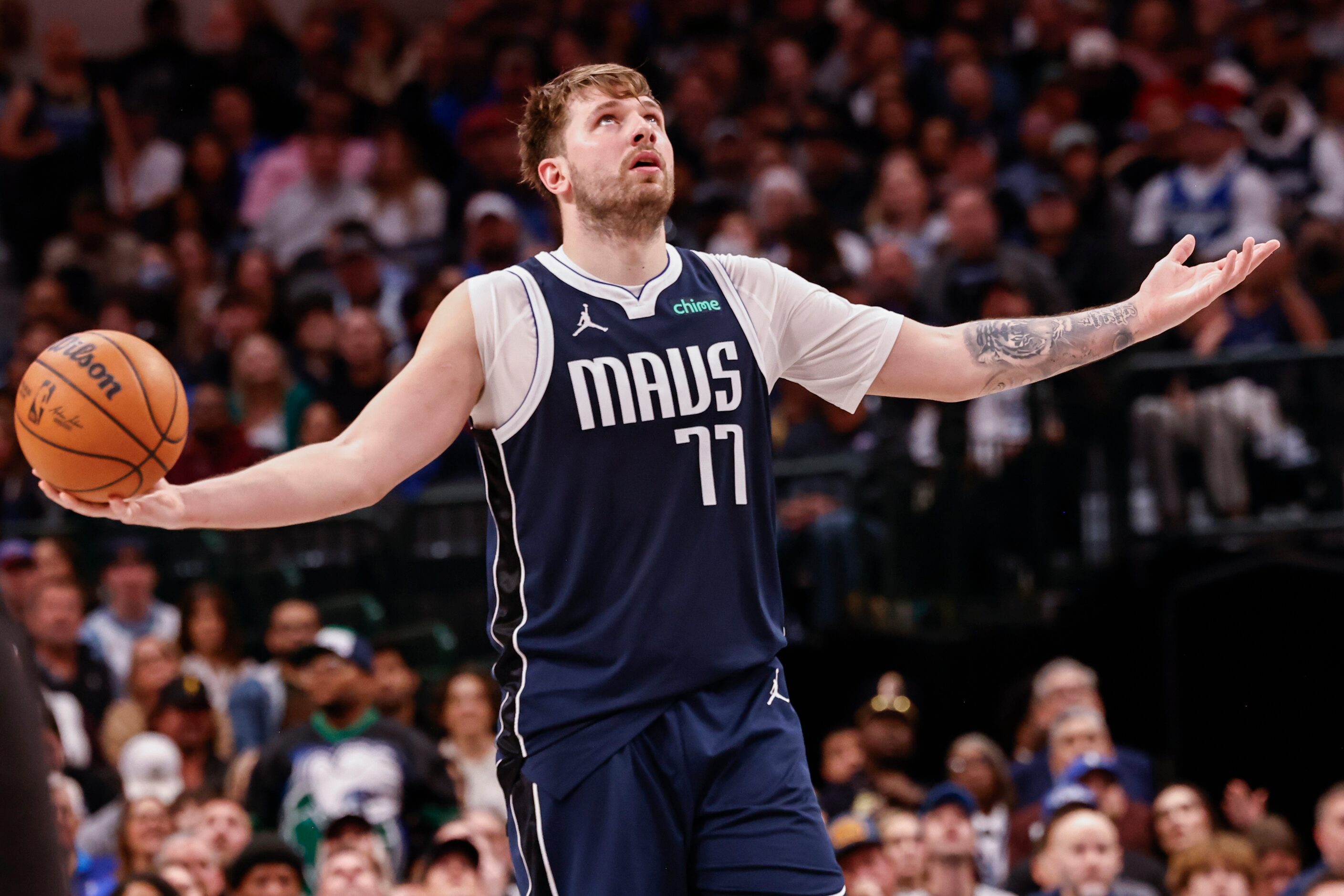 Dallas Mavericks guard Luka Dončić (77) reacts after receiving a foul during the second...