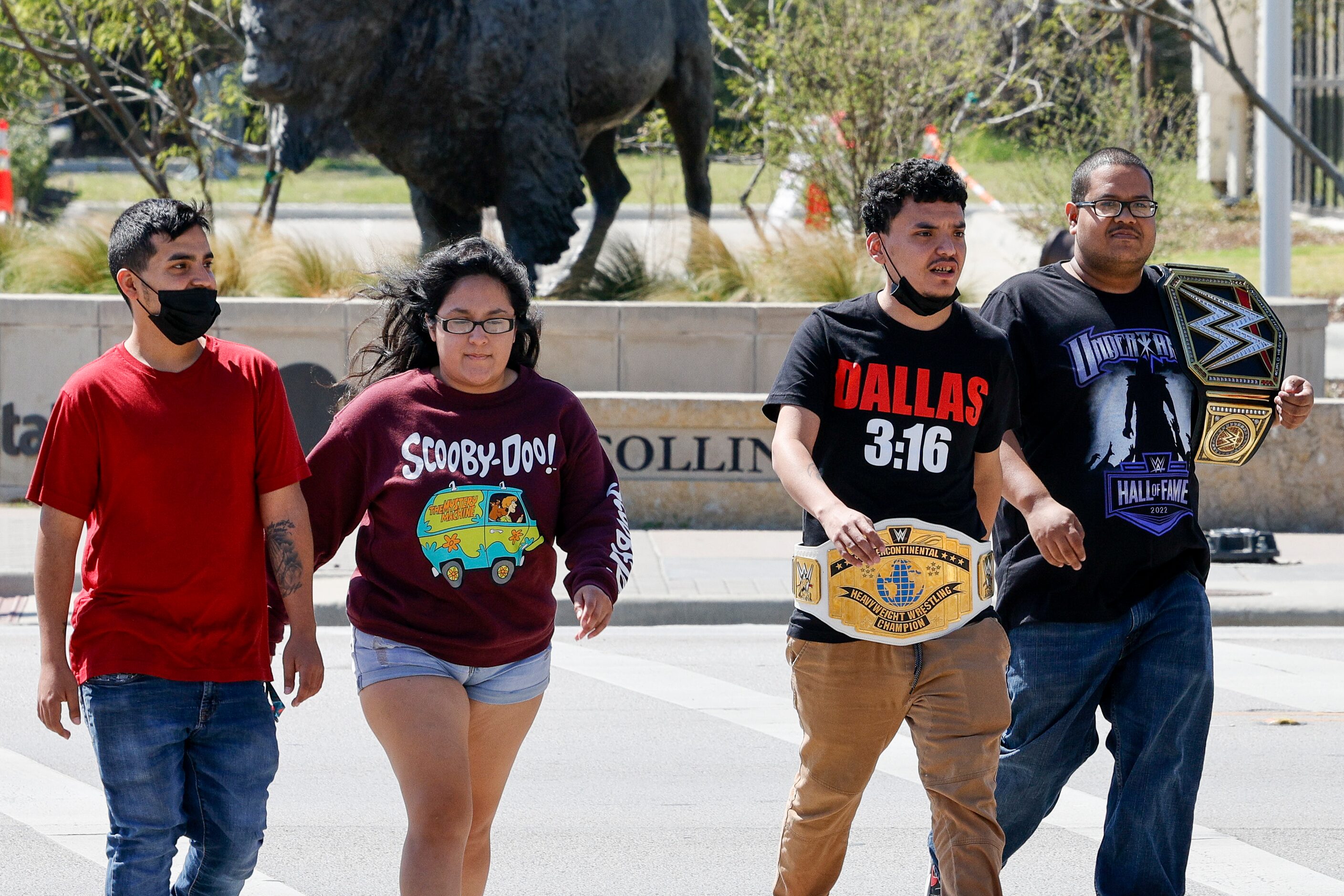 From left: Daniel Reyes, Genesis Manjarrez, Isaac Reyes, and Ronald Johnson cross Collins...