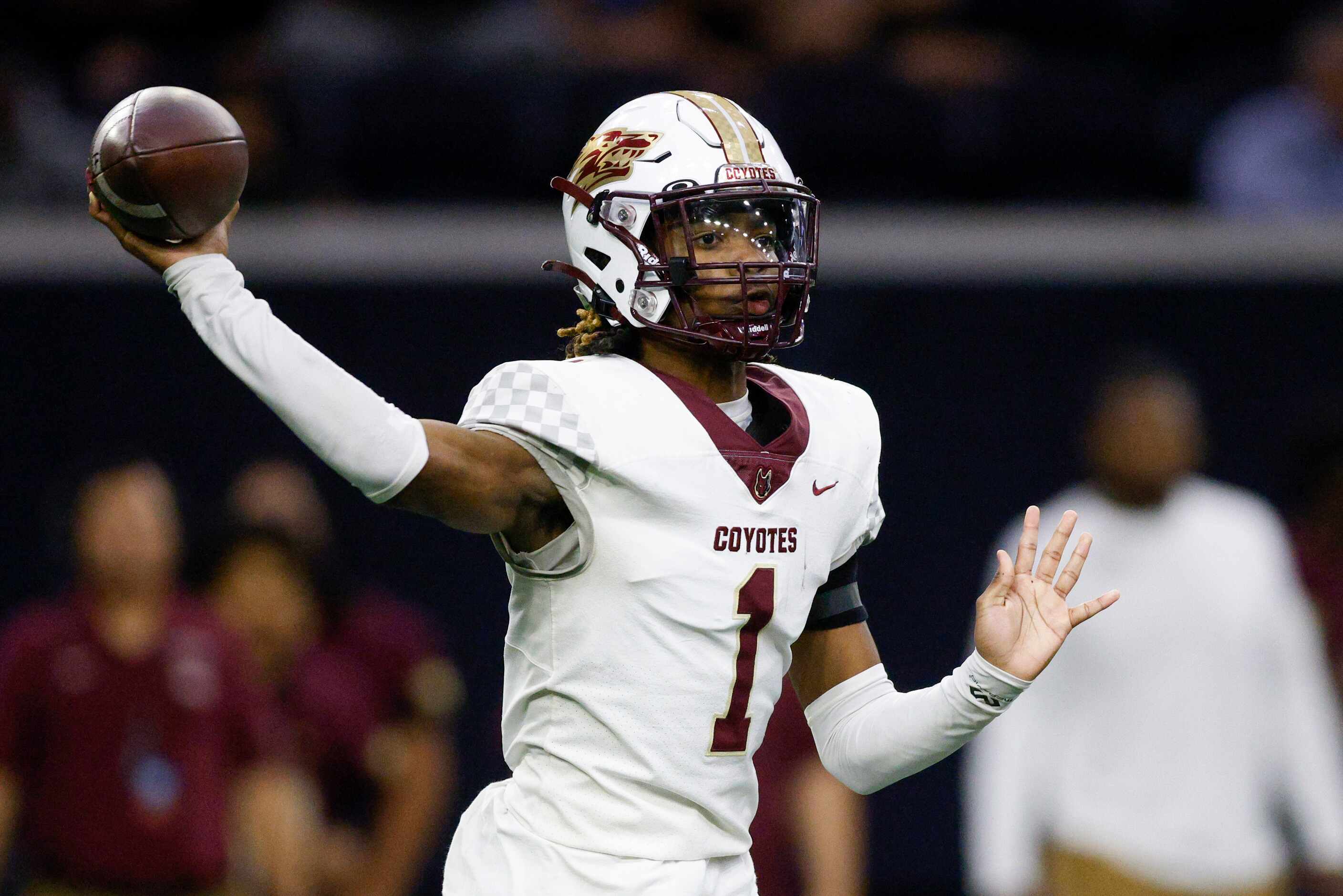 Frisco Heritage quarterback Kameron Franklin (1) throws a pass during the first half of a...