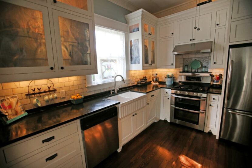 The kitchen of Jackie and Doug Sweat's home on Junius Street in Munger Place  on Tuesday,...