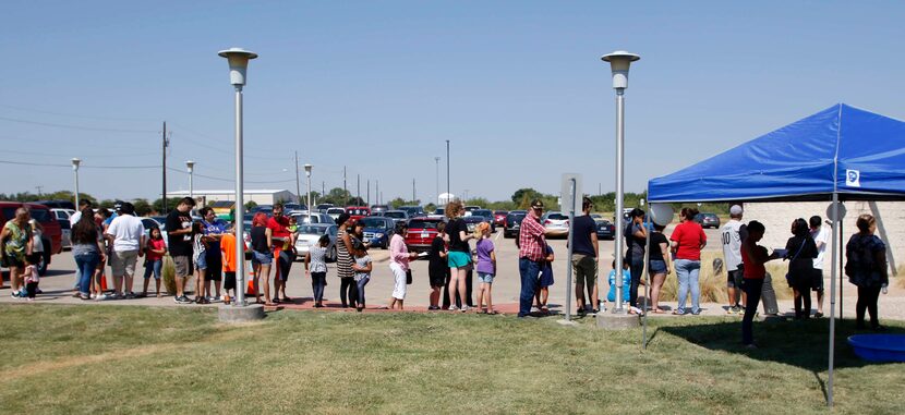 Dozens of people came out to the Clear the Shelter event at Prairie Paws Adoption Center in...