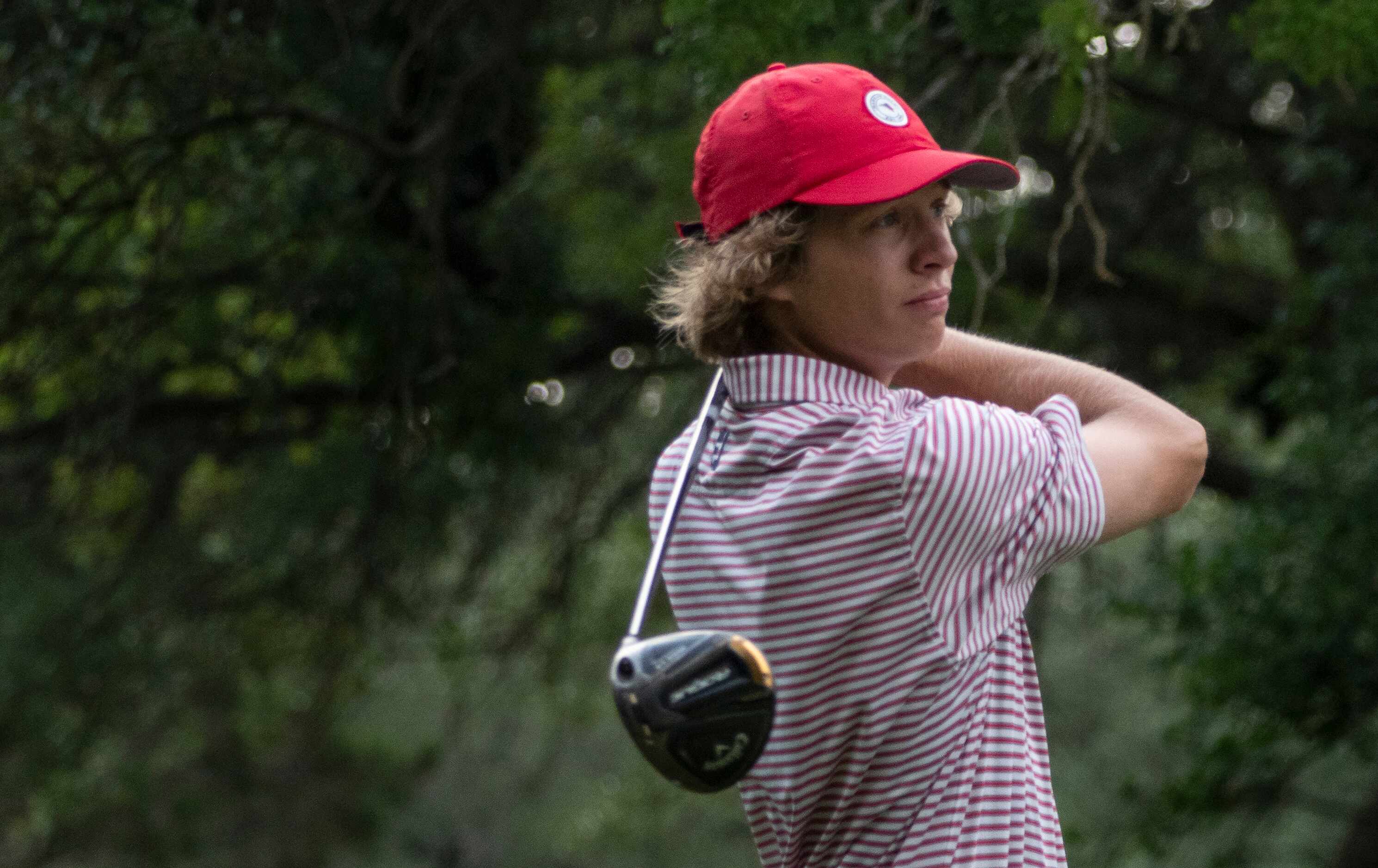 Flower Mound Marcus, Sam Pampling, tees off on the no. 2 hole during the first round of the...