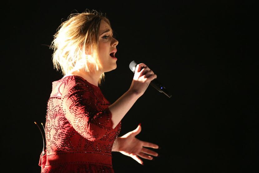 FILE - In this Feb. 15, 2016, file photo, Adele performs at the 58th annual Grammy Awards in...