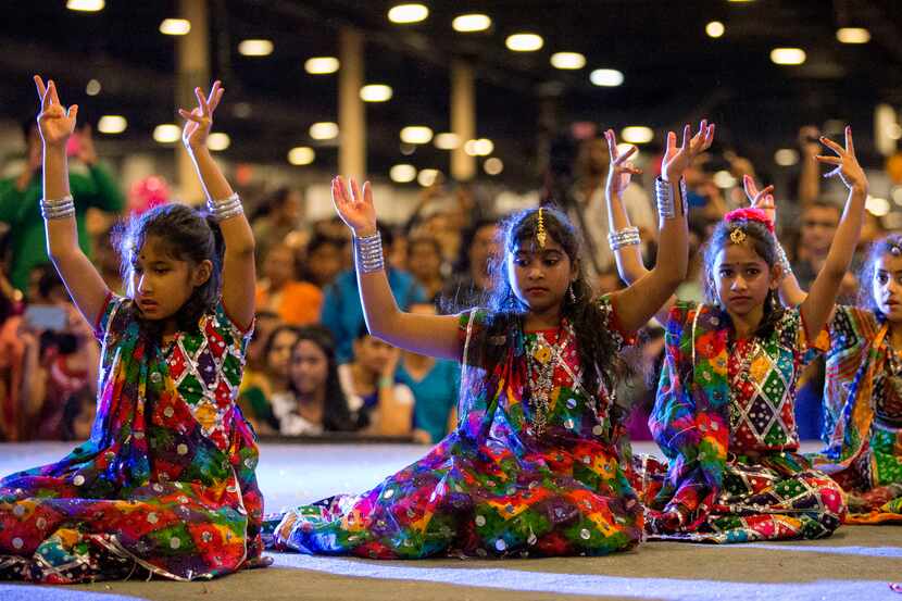 Children in dance teams perform on stage during Diwali Mela at Fair Park on Nov. 5, 2016 in...