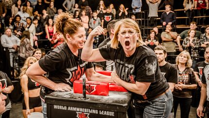 Cristina "Country Girl" Casto, on right, a grandmother of four, celebrates a hard-fought win...