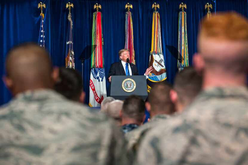 President Donald Trump makes a formal address Monday at Fort Myer in Arlington, Va., about...