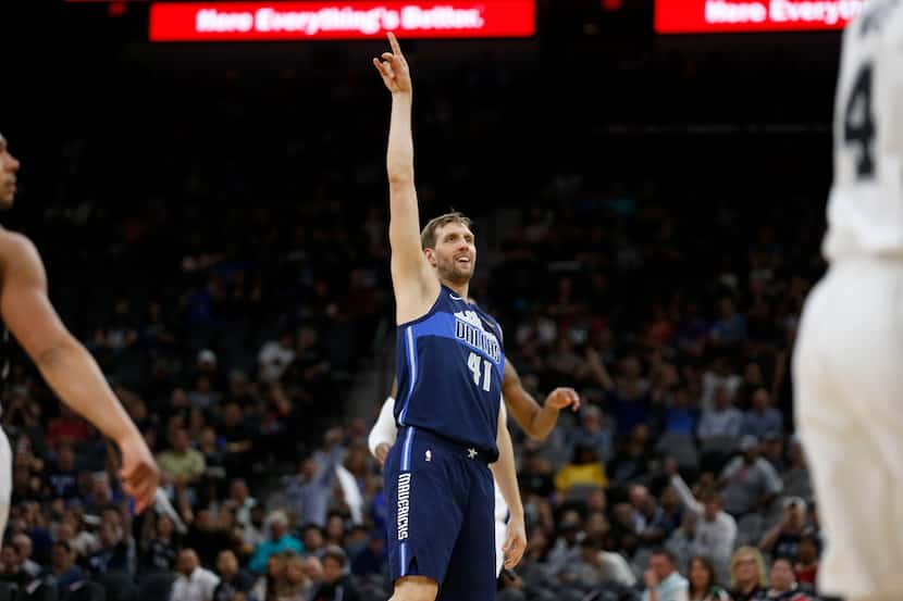 Dallas Mavericks forward Dirk Nowitzki (41) reacts after a shot during the second half of...