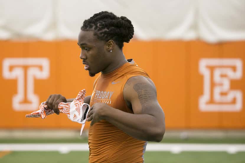 Running back D'Onta Foreman is shown during drills at the University of Texas NFL football...