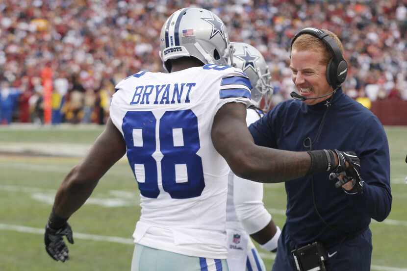 Dallas Cowboys wide receiver Dez Bryant (88) is congratulate by Dallas Cowboys head coach...