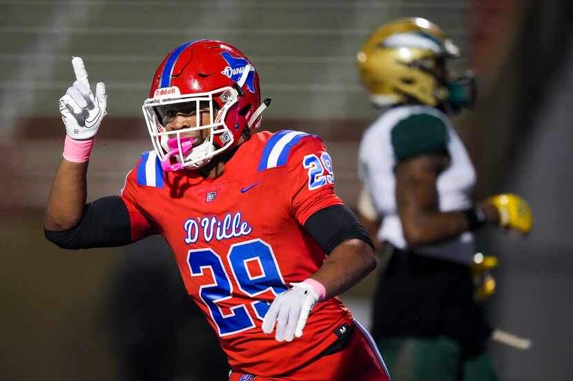 Duncanville running back Caden Durham celebrates after scoring on a 10-yard touchdown run...