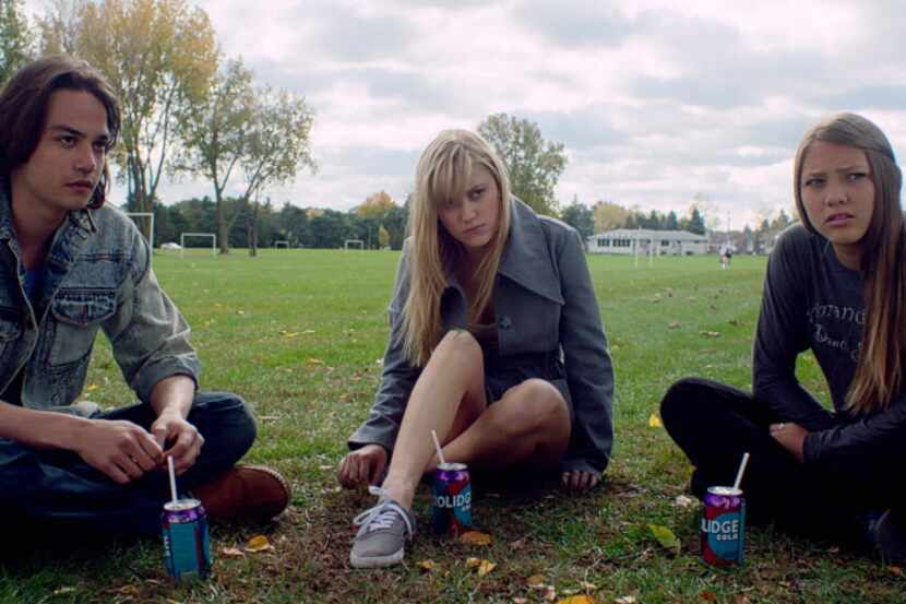 Daniel Zovatto, Maika Monroe (center) and Lili Sepe star in It Follows,  an intelligent film...