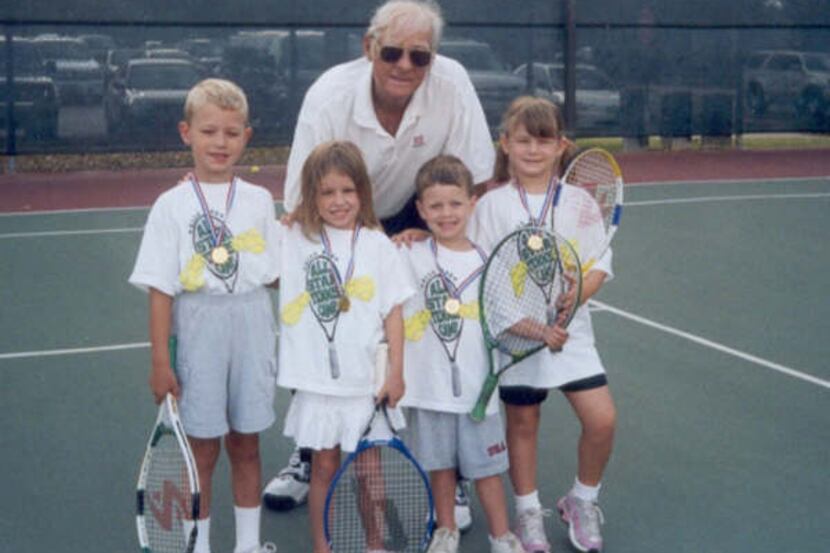 Coach Bill Bos with his tennis class at the Plano YMCA summer camp in 2006. Photo courtesy...