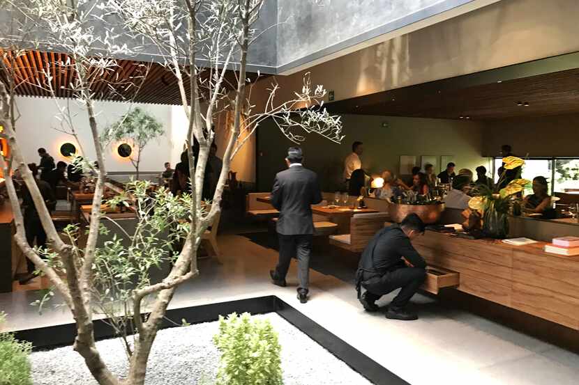 The new Pujol in Mexico City: The dining room is on the right, the omakase taco bar on the...