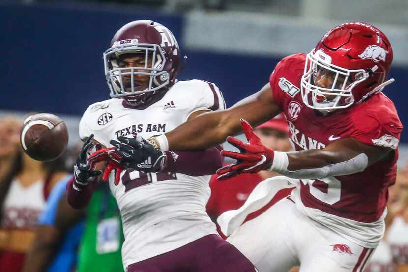 Texas A&M Aggies defensive back Charles Oliver (21) nearly intercepts a pass intended for...