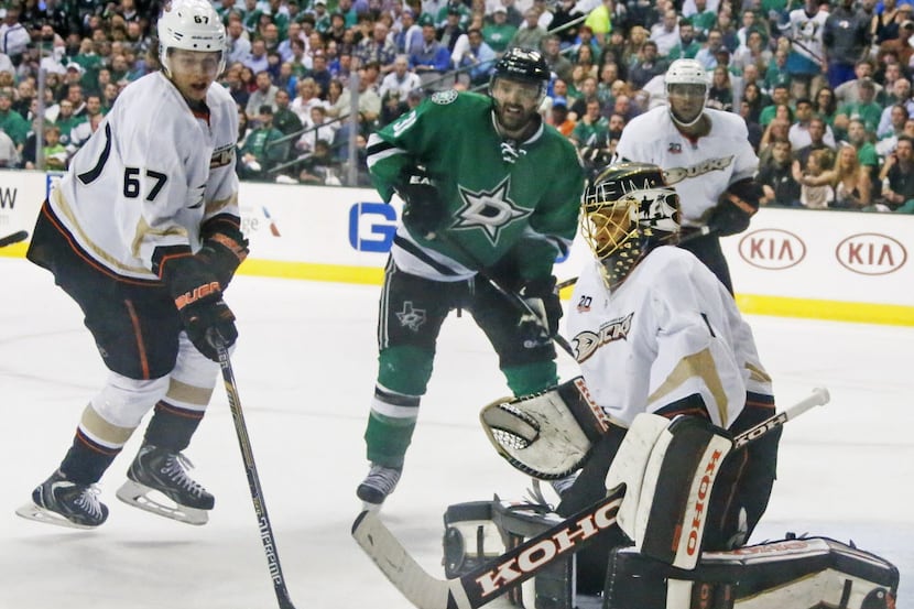 Anaheim Ducks goalie Jonas Hiller (1) deflects a shot in the third period as Dallas Stars...