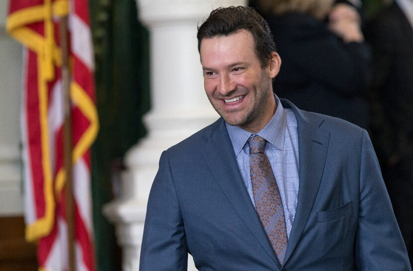 Former Dallas Cowboys quarterback Tony Romo smiles as he is recognized by the Senate at the...