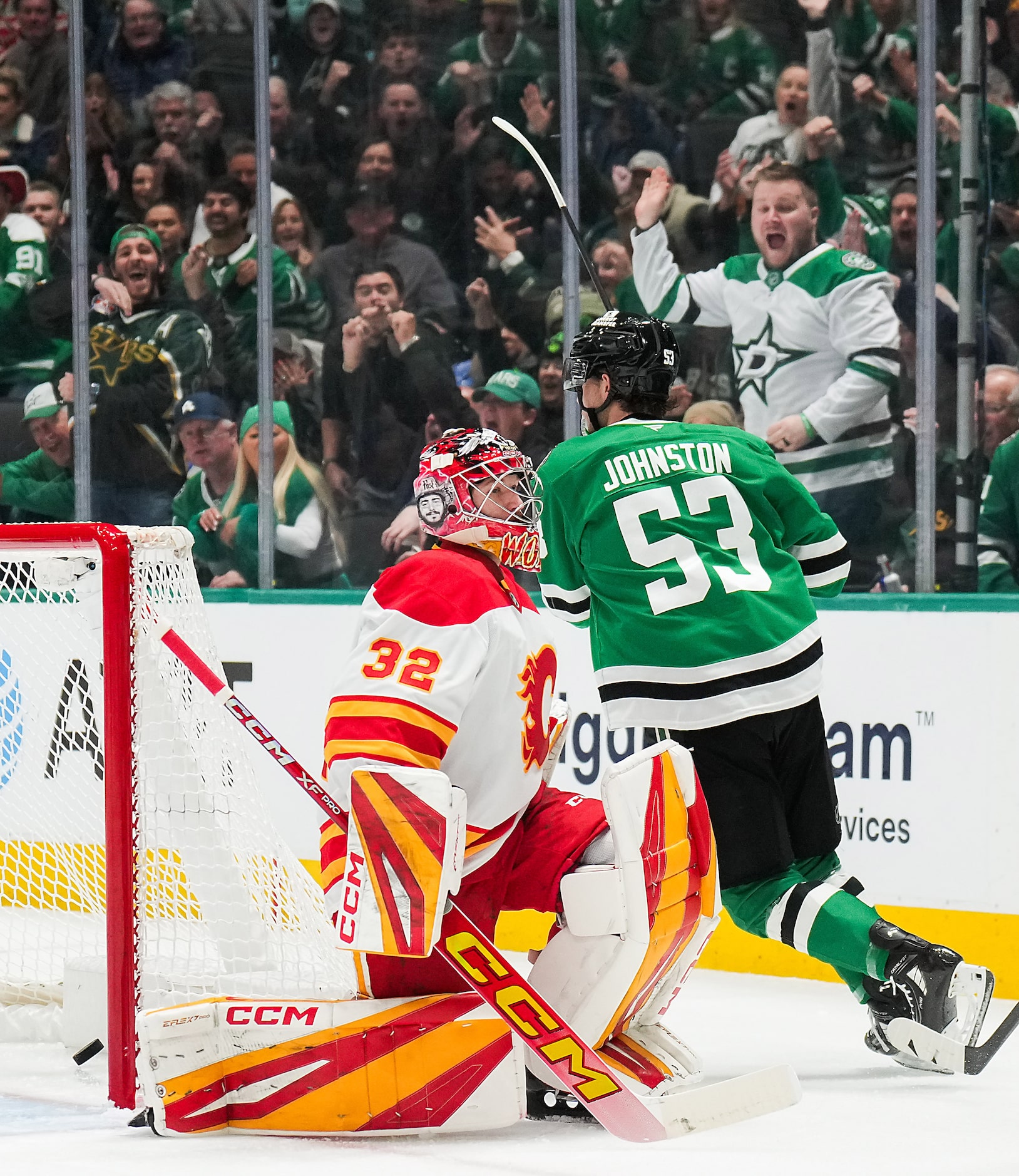 Dallas Stars center Wyatt Johnston (53) celebrates after scoring a goal against Calgary...