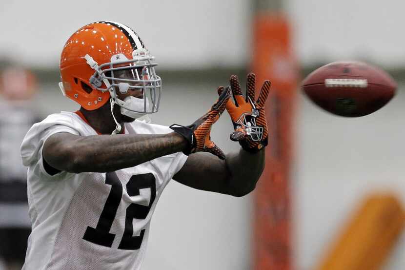 Cleveland Browns wide receiver Josh Gordon makes a catch during practice at the NFL football...