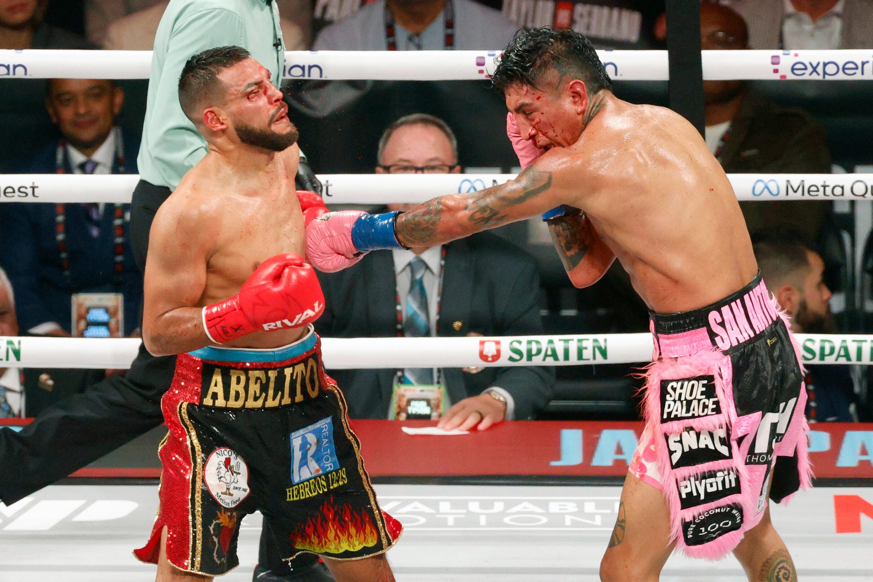 Mario Barrios throws a punch at Abel Ramos during round 12 of a boxing match for the WBC...