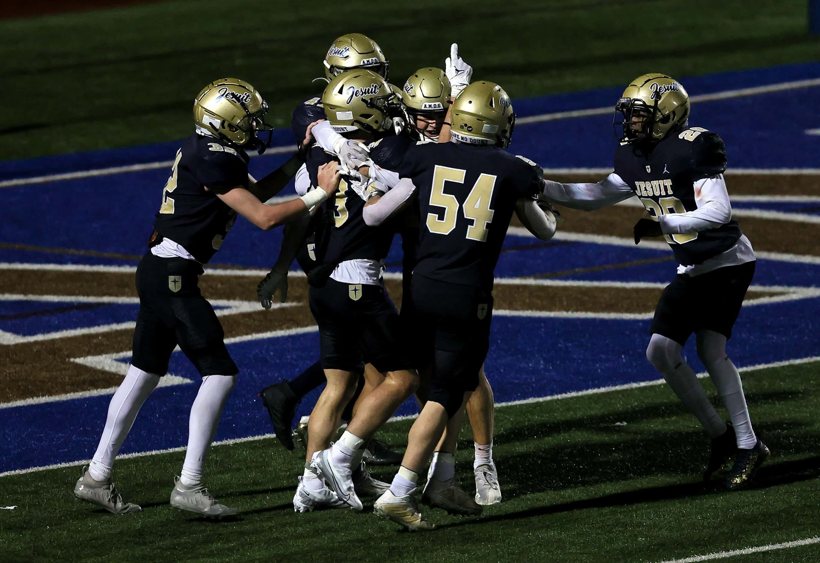 The Jesuit Rangers celebrate a victory over MacArthur, 16-12 in a District 7-6A High School...