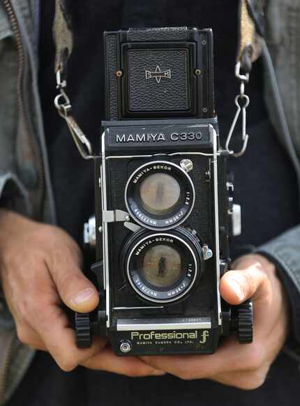 Dallas photographer Brandon Thibodeaux  shows the Mamiya C330 he uses. 