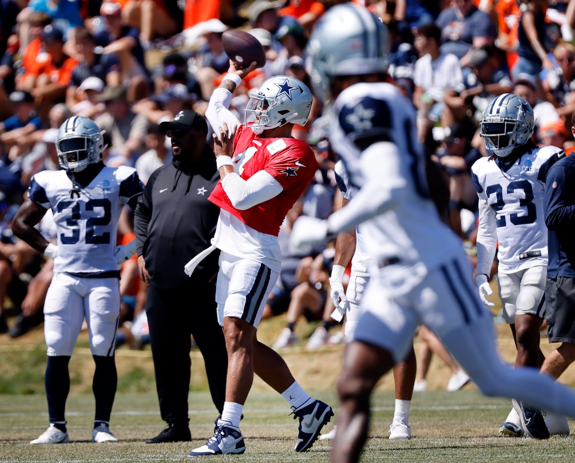 Dallas Cowboys quarterback Dak Prescott (4) throws a pass before facing the Denver Broncos...