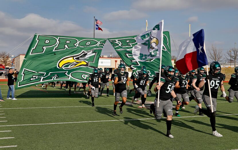 The Prosper High School football team takes the field to start the second half as Prosper...