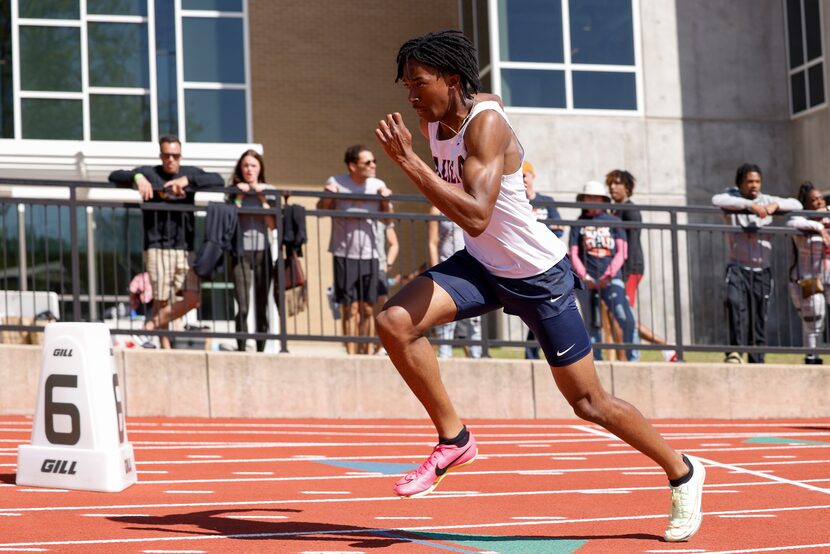 Allen’s Jonathan Simms runs during the 6A 400 meter dash during the Jesuit-Sheaner Relays at...