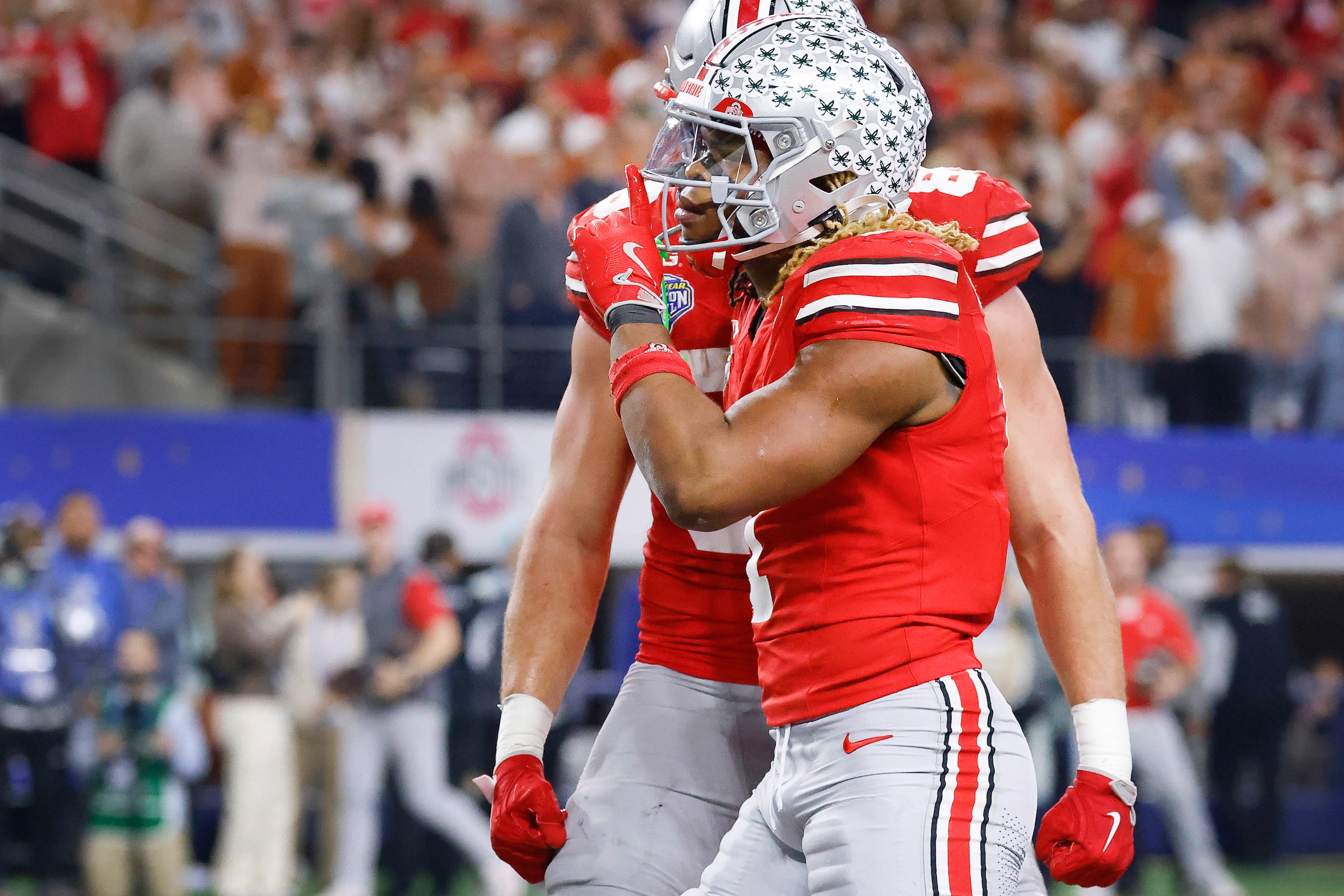 Ohio State Buckeyes running back Quinshon Judkins (1) reacts after scoring a fourth quarter...