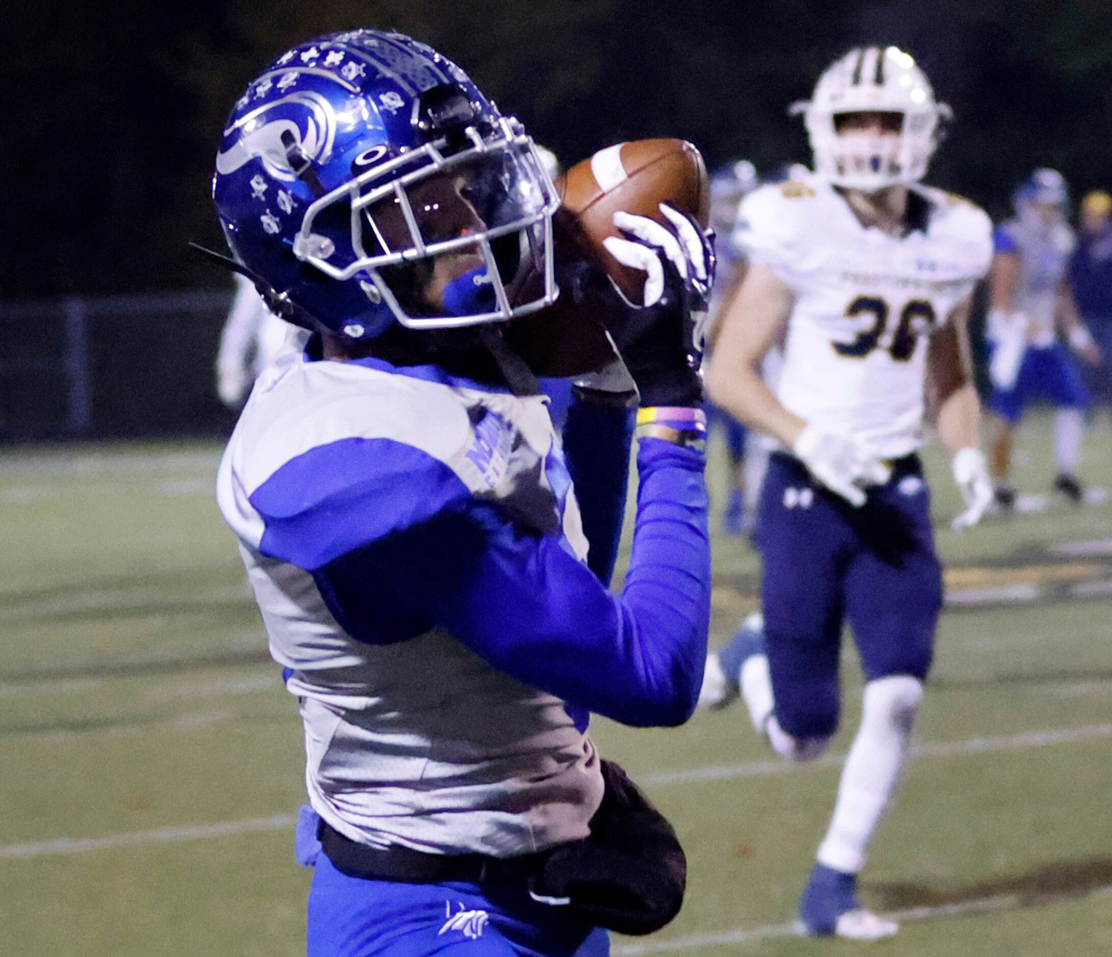 Fort Worth Nolan receiver Jaiden Burnett (6) pulls down in a long pass before racing down...