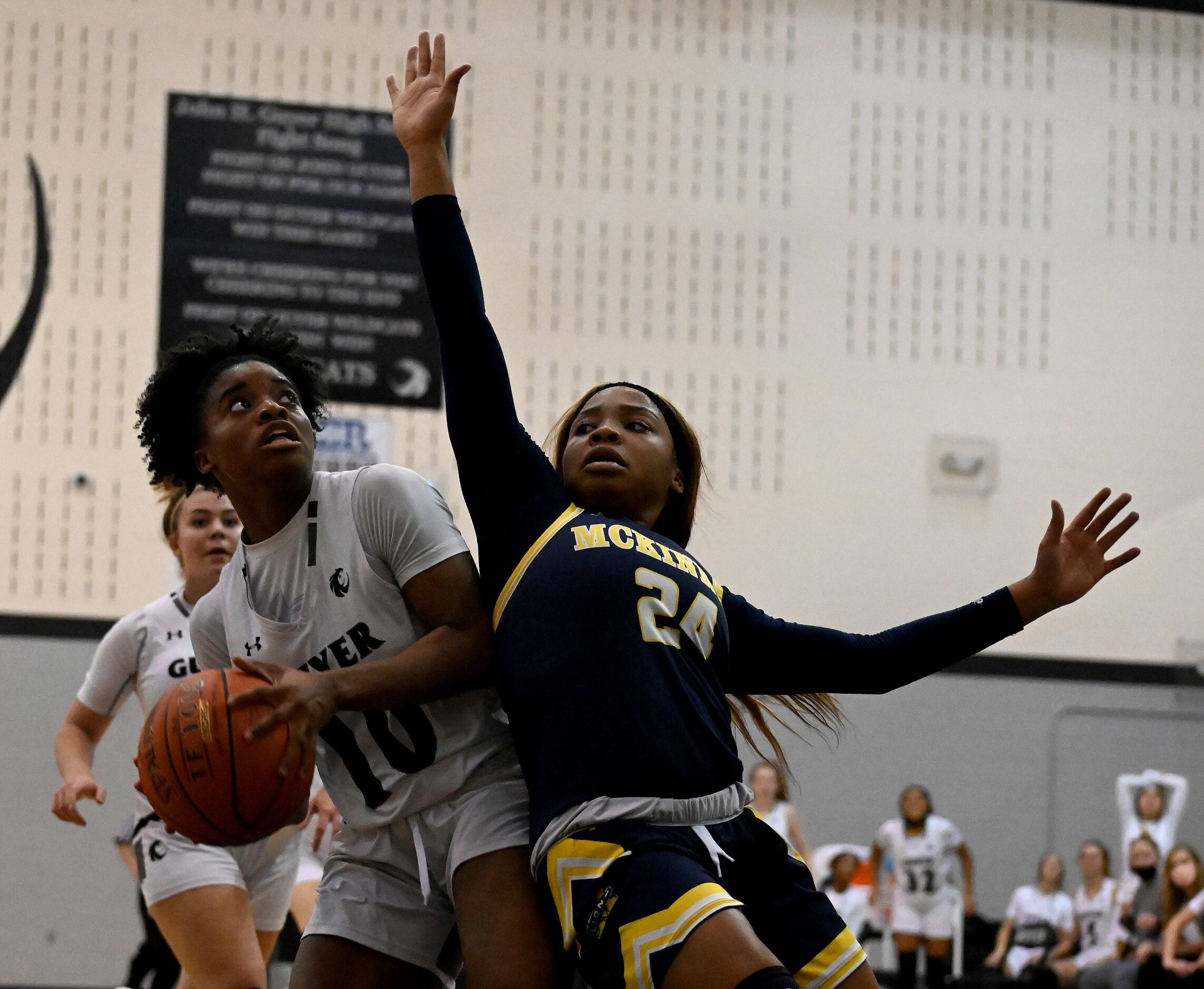 Denton Guyer’s Hailey Mason (10) looks to shoot over McKinney’s Chioma Ukaji (24) in the...