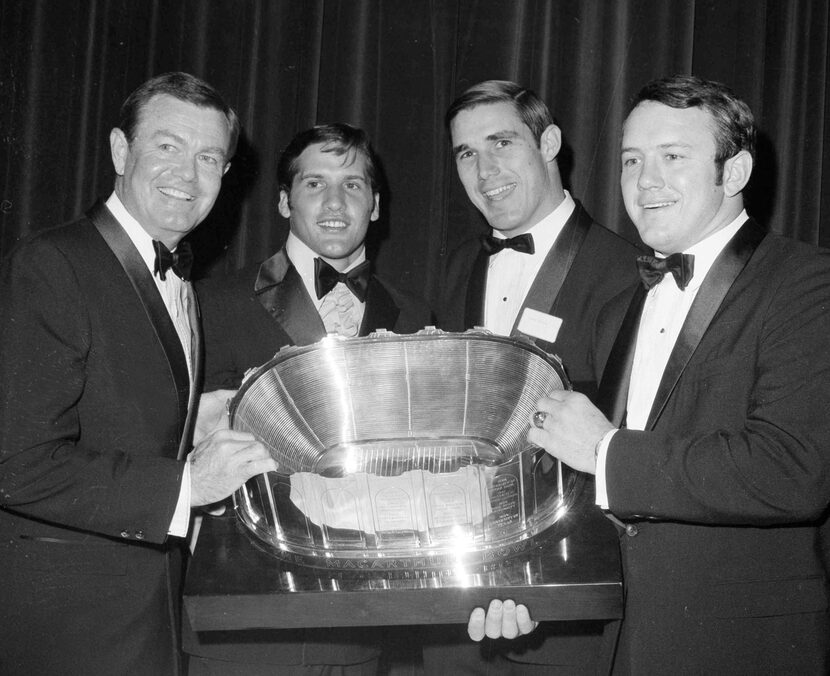 Texas coach Darrell Royal, left, and his Longhorns' tri-captains, from left to right, James...