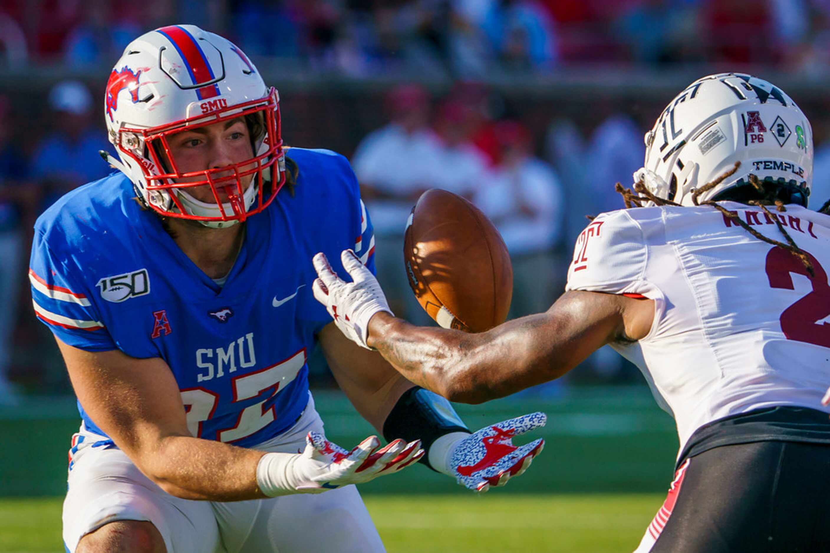 SMU safety Michael Salerno (27) reaches for a fumble by Temple wide receiver Isaiah Wright...