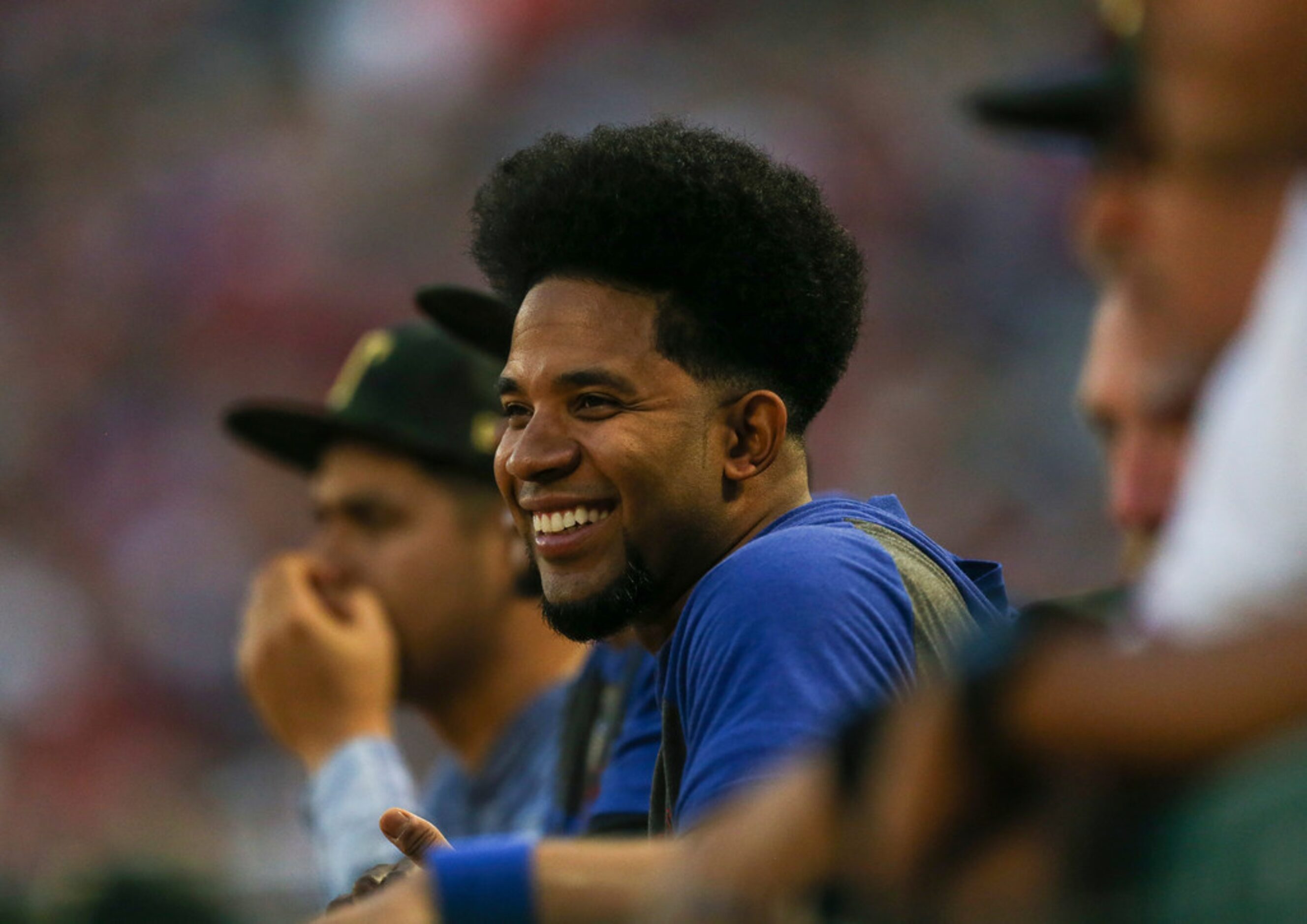 Elvis Andrus reacts from the dugout during a matchup between the Texas Rangers and the St....