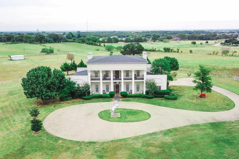 Offered at $1.7 million, the 20-plus-acre ranch at 5500 FM424 in Cross Roads features a main...