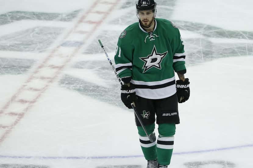 Dallas Stars center Tyler Seguin (91) heads toward the penalty box after being called for...