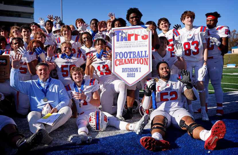 Parish Episcopal players and head coach Daniel Novakov (left) pose for photos after winning...