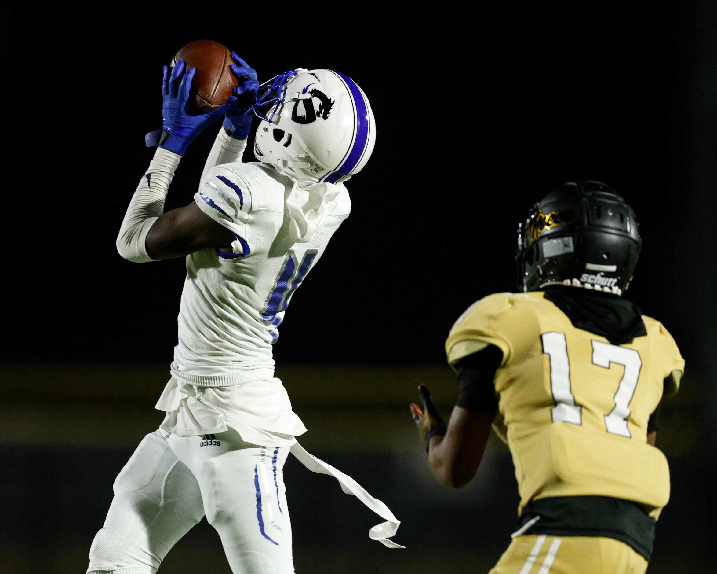 Seagoville defensive back Damarion Watson (4) intercepts a pass intended for South Oak Cliff...