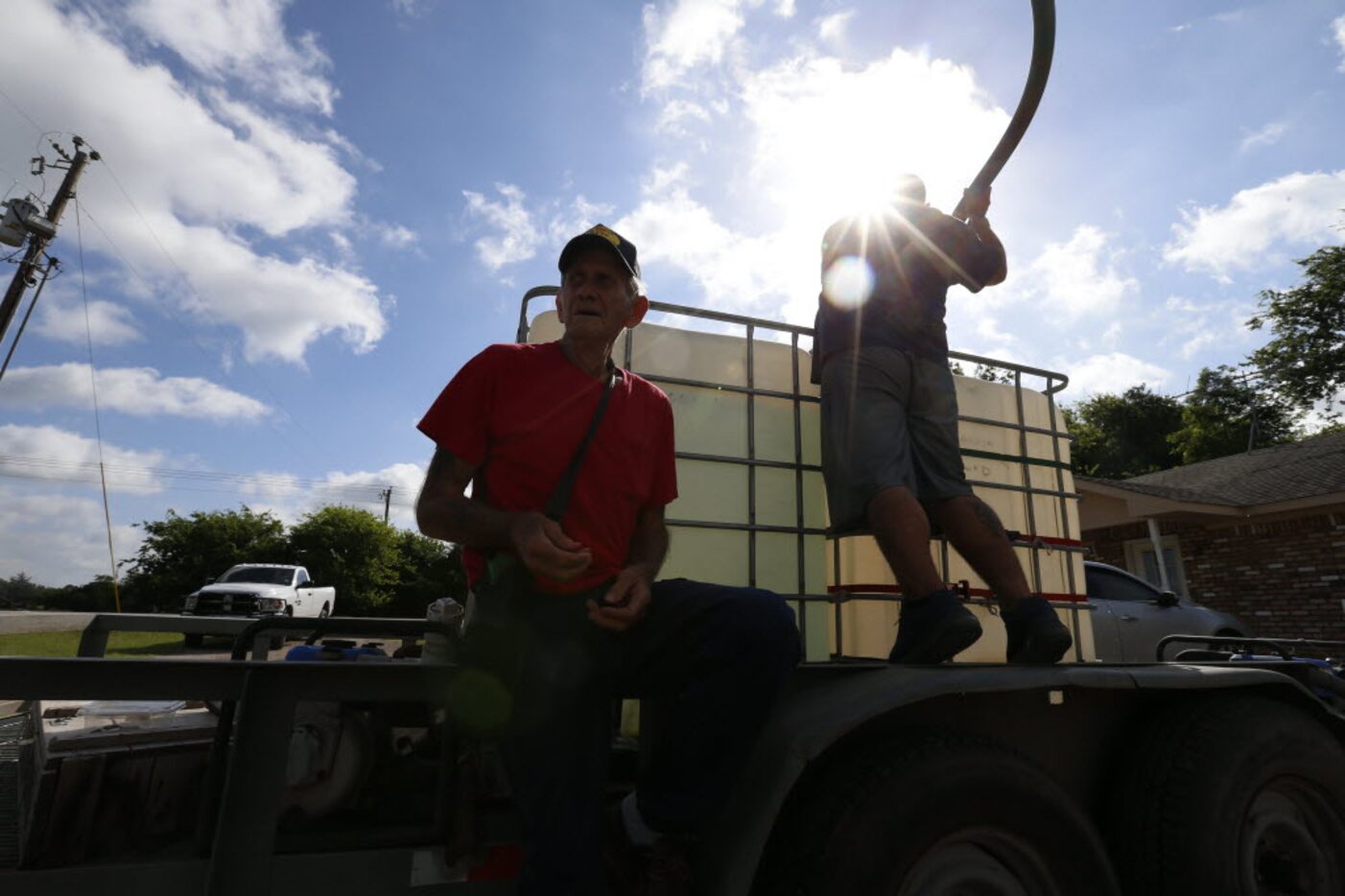 Stephen Nevil, 72, bought water at the Combine water tower in July. Nevil said he fills up...