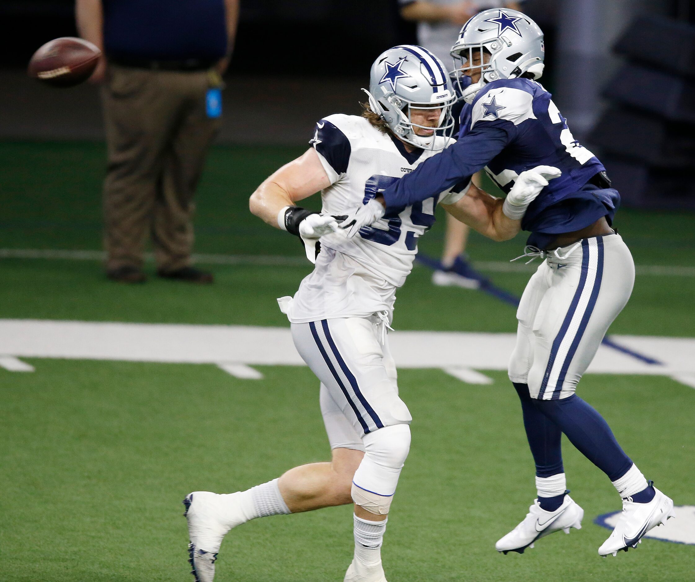 Dallas Cowboys safety Xavier Woods (25) breaks up a pass intended for Dallas Cowboys tight...