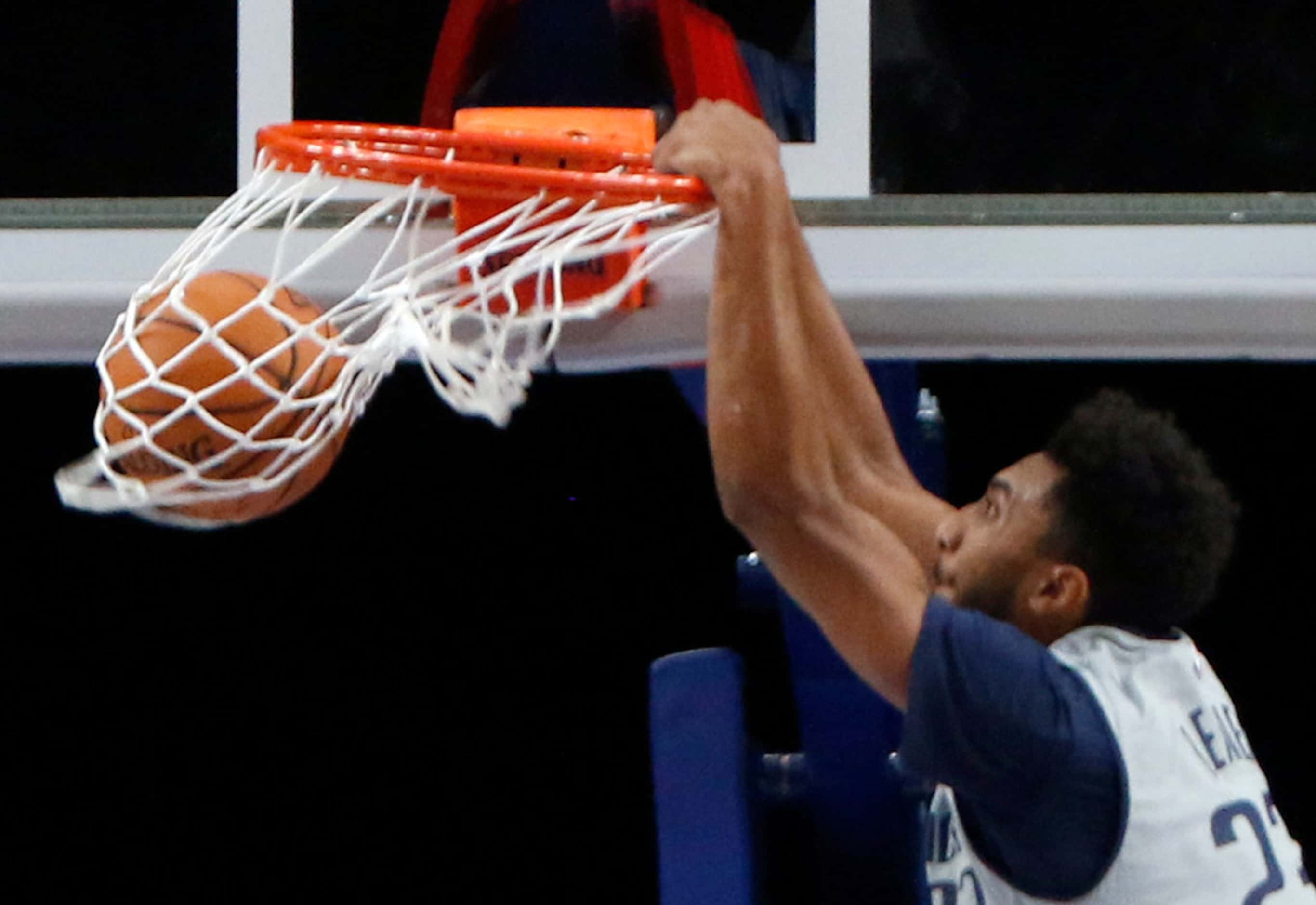 Dallas Mavericks guard Josh Reaves (23) scores on a dunk during an intra-squad scrimmage....