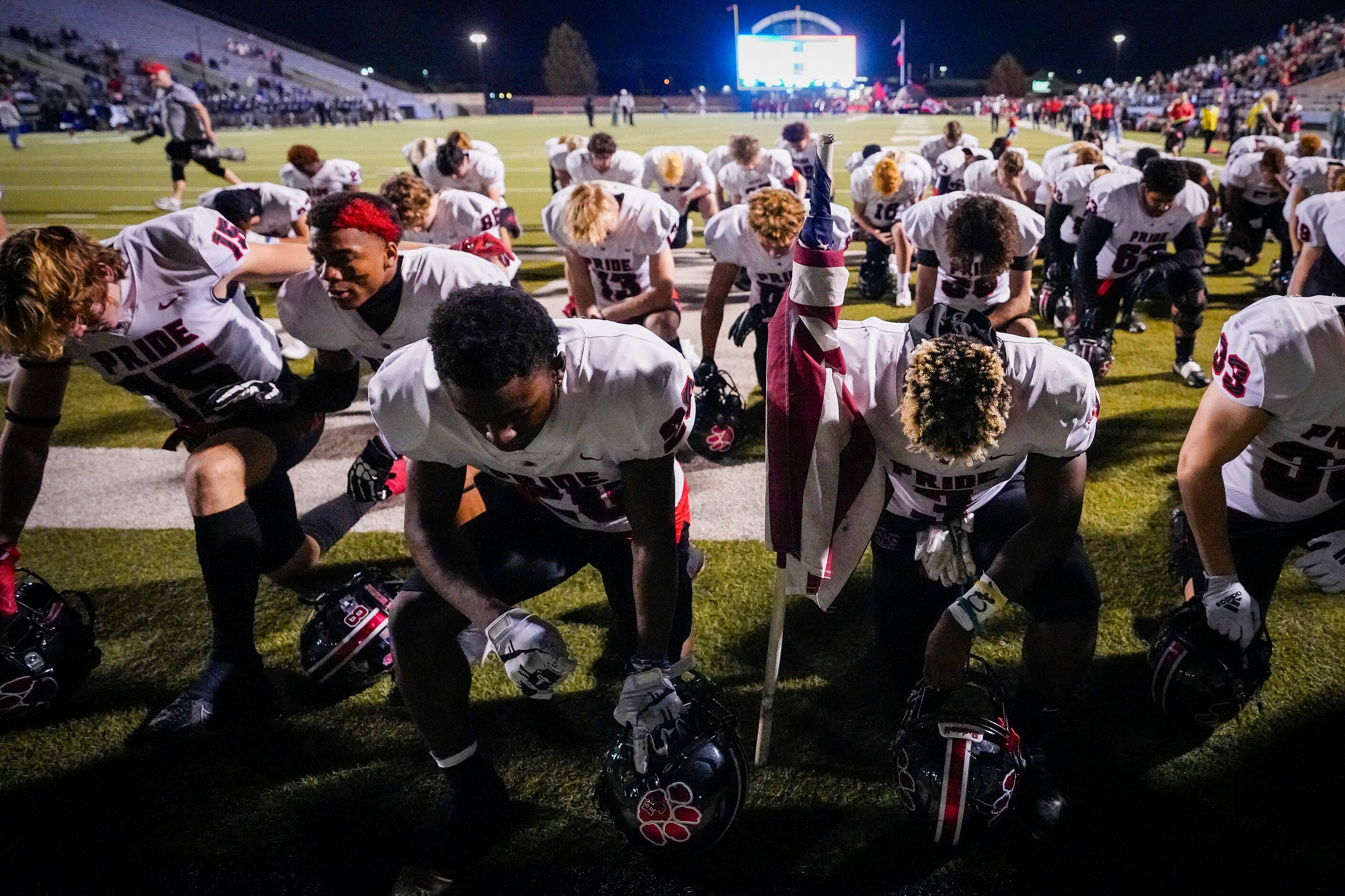 Colleyville Heritage defensive lineman Keyvaughn Connor (28) and running back Isaac Shabay...