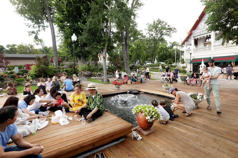 Guests enjoy the food and atmosphere during the Sunday Thai Food Market.